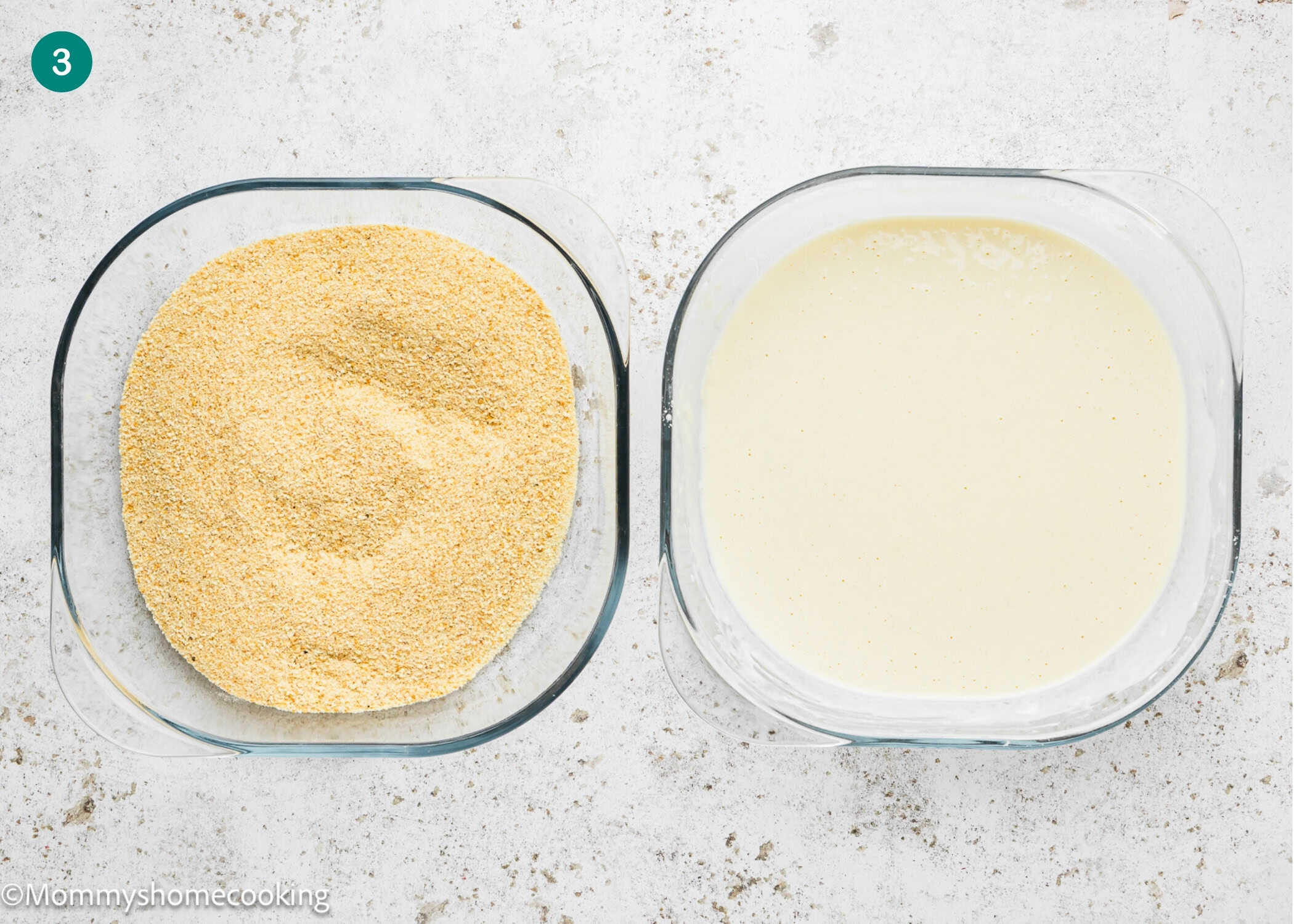 Two glass containers: one filled with breadcrumbs, the other with a pale liquid mixture for Crispy Eggless Pork Schnitzel (egg and dairy free), placed side by side on a light countertop.